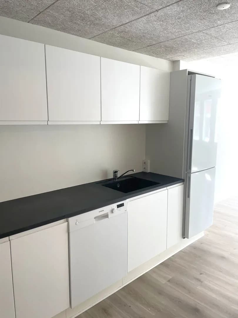 Lys og moderne 2-værelses lejlighed midt i Kolding C